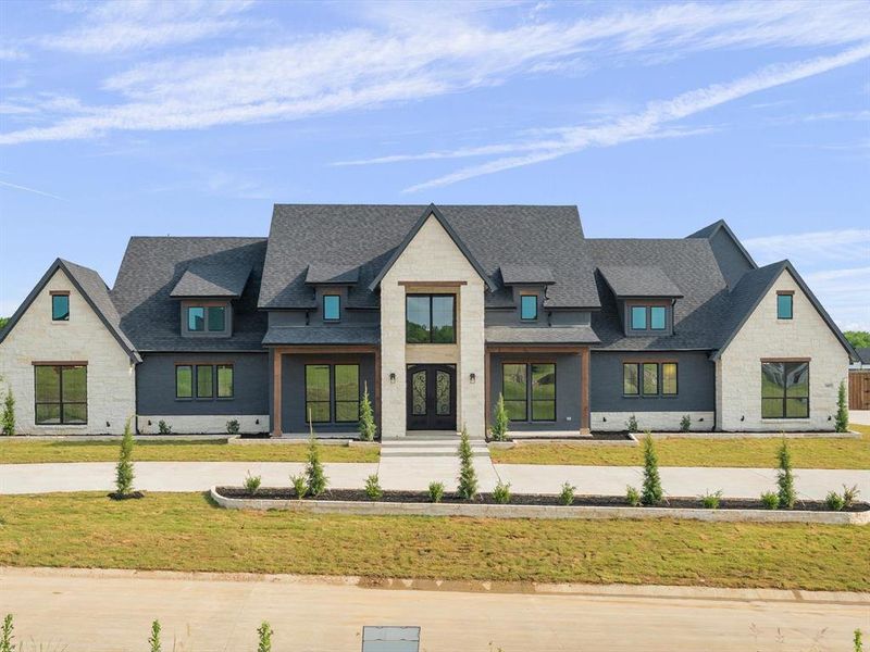 Front exterior of a new home in Capitol Hill, Anna, TX, highlighting curb appeal (Image 2). Front exterior of a new home in Capitol Hill, Anna, TX, highlighting curb appeal (Image 2).