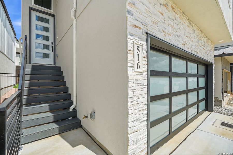 Exterior details and patio area of a home in Centero at Stone Oak, San Antonio (Image 29). Exterior details and patio area of a home in Centero at Stone Oak, San Antonio (Image 29).