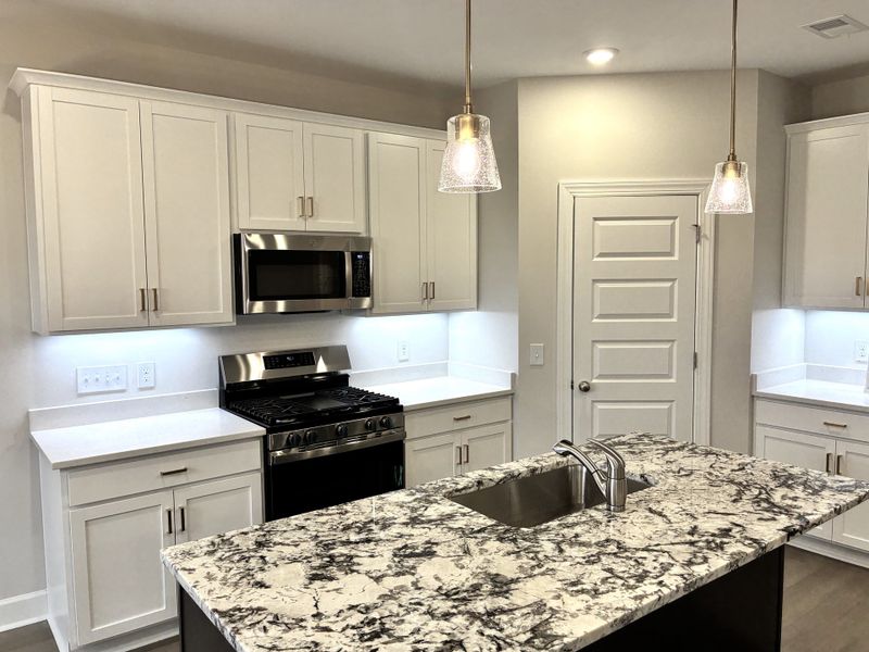 Furnished interior view inside a new home in Holly Ridge, Greenville (Image 5).
