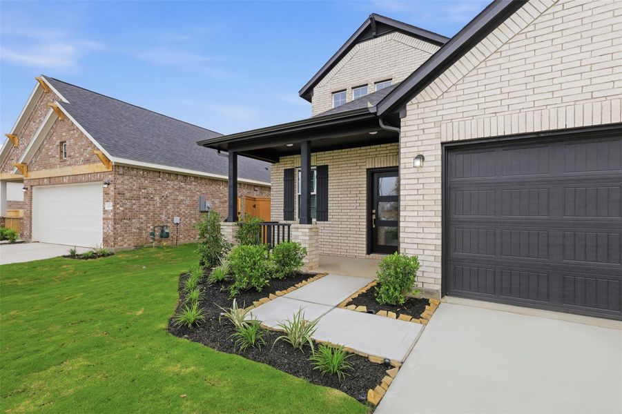Step closer to the inviting covered front porch, framed with thoughtful landscaping and clean finishes, creating a cozy spot to relax and enjoy peaceful mornings or quiet evenings. Step closer to the inviting covered front porch, framed with thoughtful landscaping and clean finishes, creating a cozy spot to relax and enjoy peaceful mornings or quiet evenings.