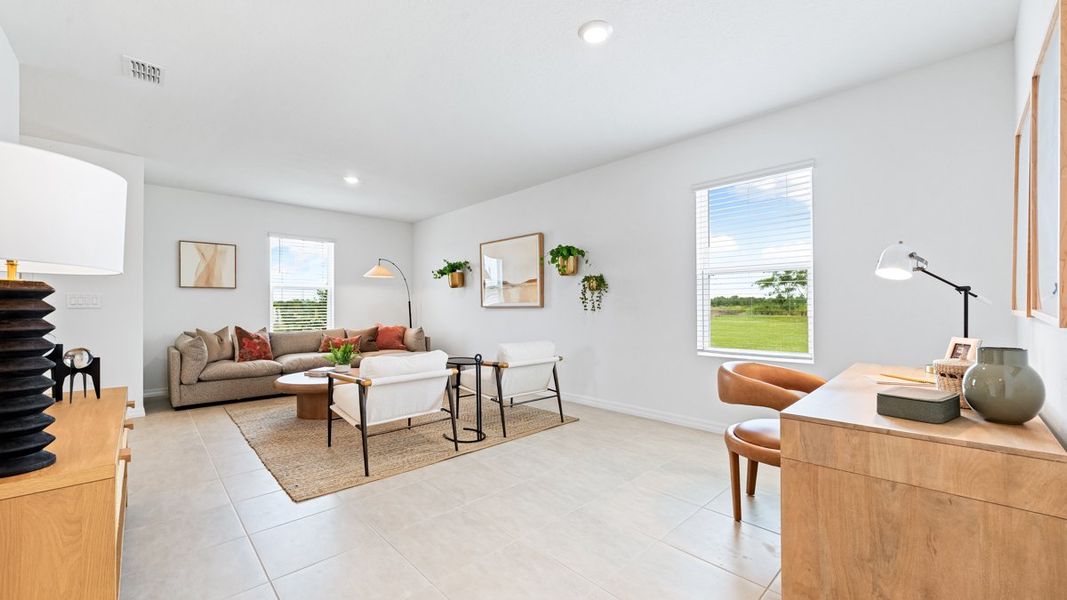 Representative furnished interior of a home built from the Seneca by Taylor Morrison in Palm Wind, Hudson (Image 9).