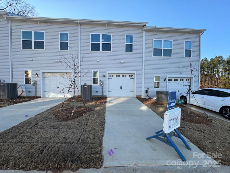Exterior details and patio area of a home in Lakeview Village, Charlotte (Image 3). Exterior details and patio area of a home in Lakeview Village, Charlotte (Image 3).