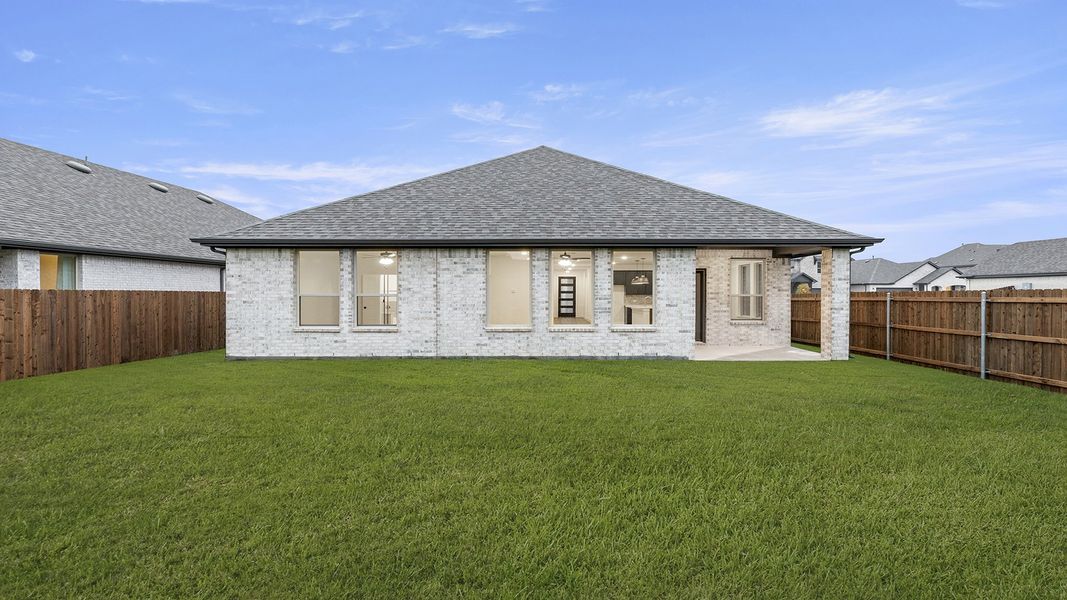 Exterior details and patio area of a home in The Oaks, Red Oak (Image 4). Exterior details and patio area of a home in The Oaks, Red Oak (Image 4).