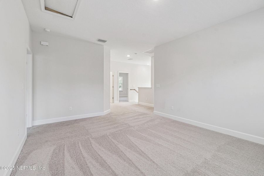 Spacious, unfurnished interior of a new home in Tributary 70', Yulee (Image 18).