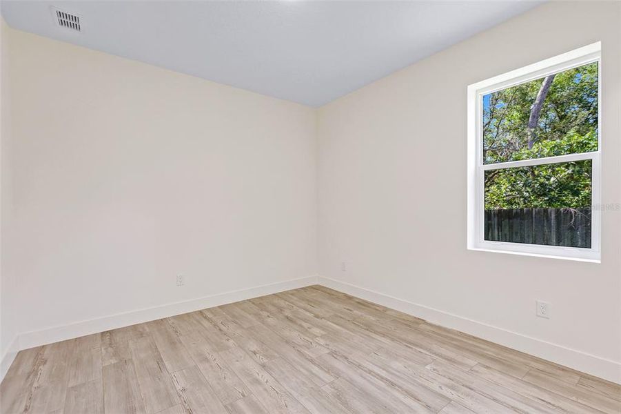 Spacious, unfurnished interior of a new home in , New Smyrna Beach (Image 42).