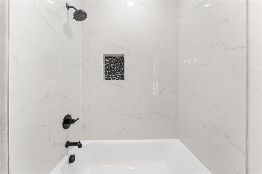 Full bathroom featuring shower / washtub combination
