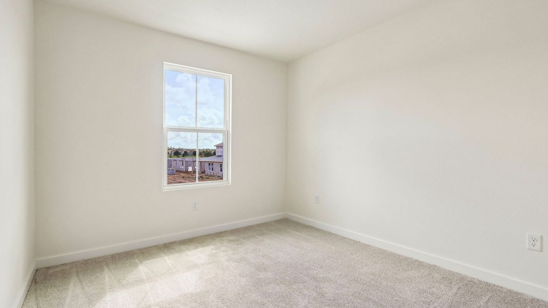 Furnished interior view inside a new home in Cyrene at Harmony, St. Cloud (Image 33).