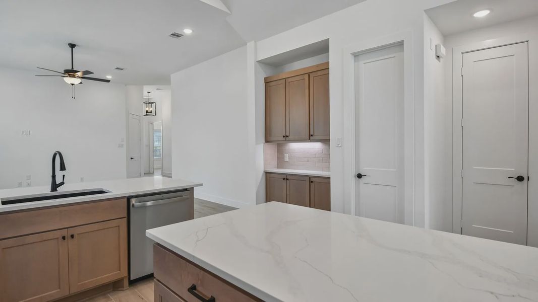 Furnished interior view inside a new home in Artavia, Conroe (Image 11).