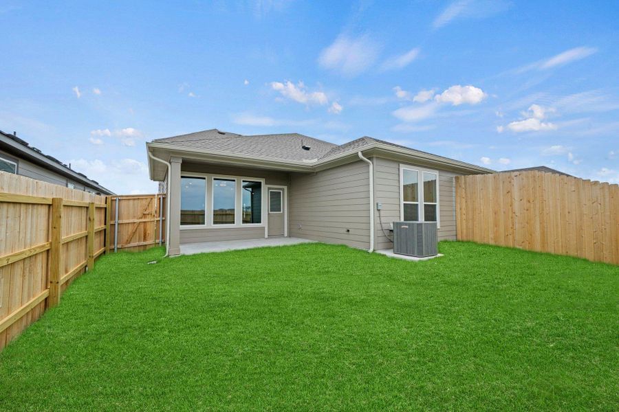 Rear of Home and Private Backyard