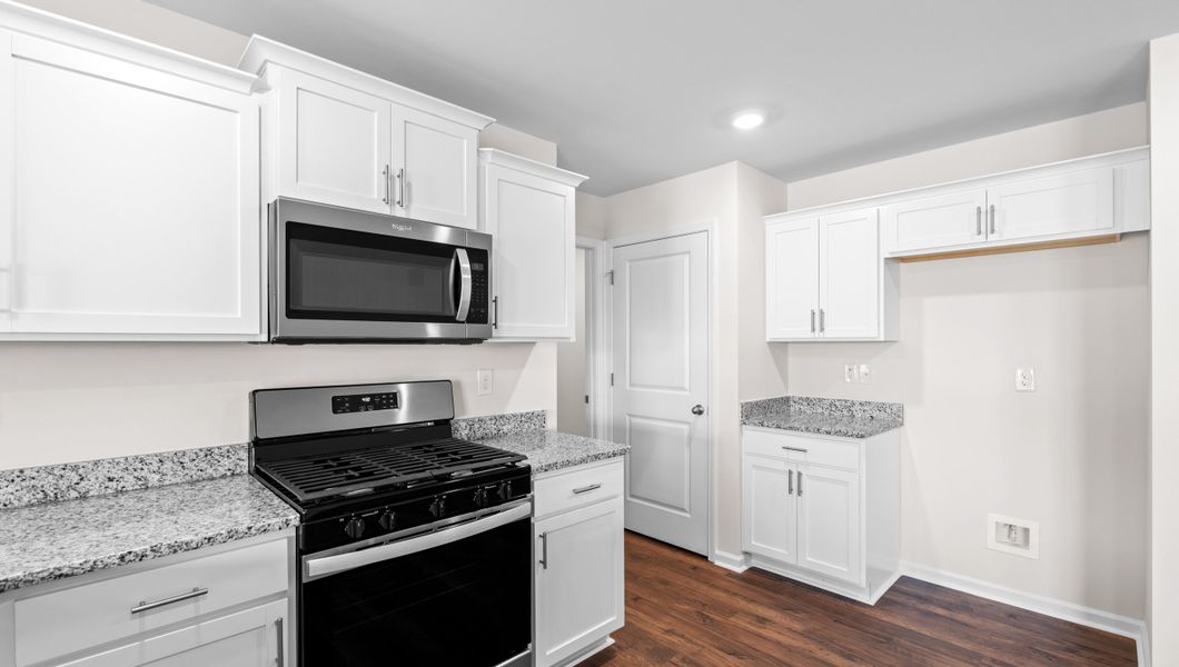 Representative furnished interior of a home built from the Macon by D.R. Horton in Lightwood Cottages, Moore (Image 8).