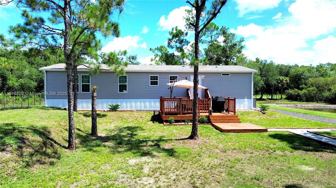 Front exterior of a new home in , Clewiston, FL, highlighting curb appeal (Image 23).