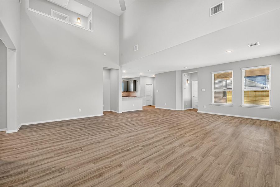 Spacious, unfurnished interior of a new home in Sunterra, Katy (Image 16).