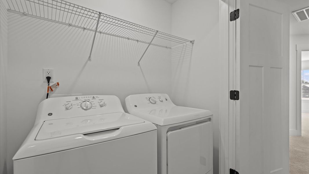 Furnished interior view inside a new home in Aspen Ridge, Lyman (Image 24).