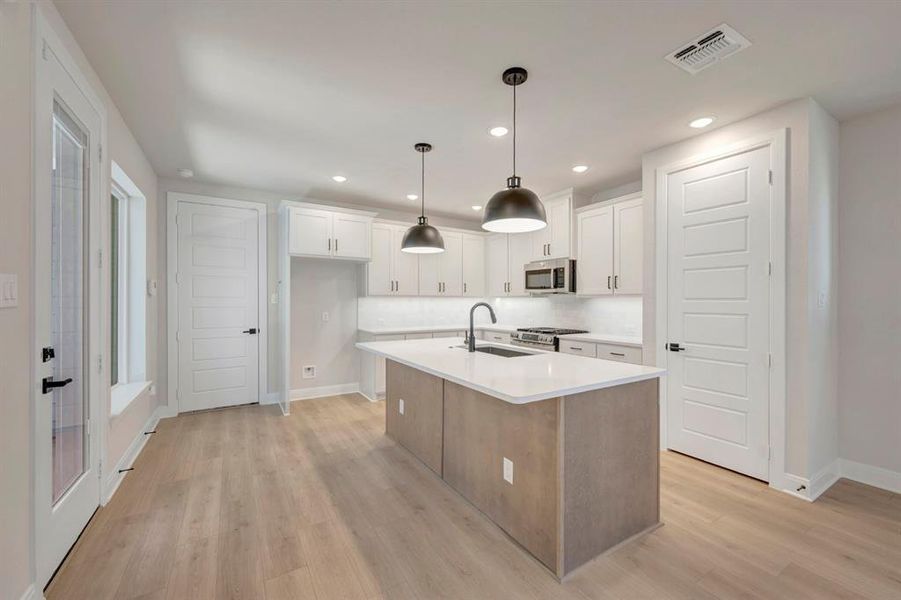Furnished interior view inside a new home in Painted Tree Woodland West – Cottages, McKinney (Image 12).