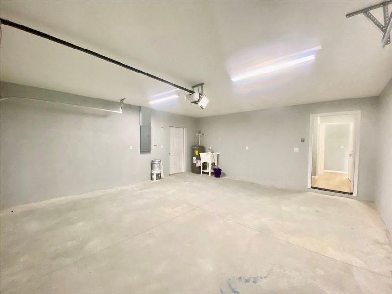 garage with side service garage door