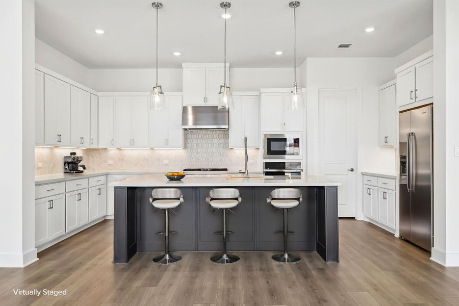 Representative furnished interior of a home built from the Rainey by Taylor Morrison in Santa Rita Ranch, Liberty Hill (Image 4).