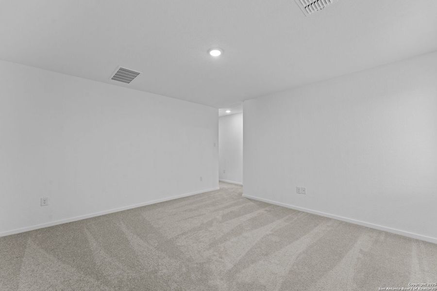 Spacious, unfurnished interior of a new home in Torian Village: Belmar Collection, San Antonio (Image 22).