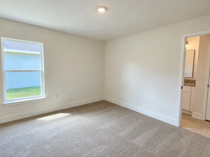 Spacious, unfurnished interior of a new home in Harmony Central, St. Cloud (Image 16).