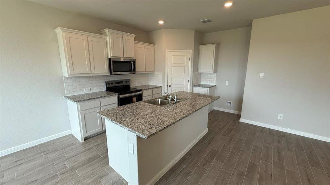 Kitchen - All Home and community information, including pricing, included features, terms, availability and amenities, are subject to change at any time without notice or obligation. All Drawings, pictures, photographs, video, square footages, floor plans, elevations, features, colors and sizes are approximate for illustration purposes only and will vary from the homes as built.