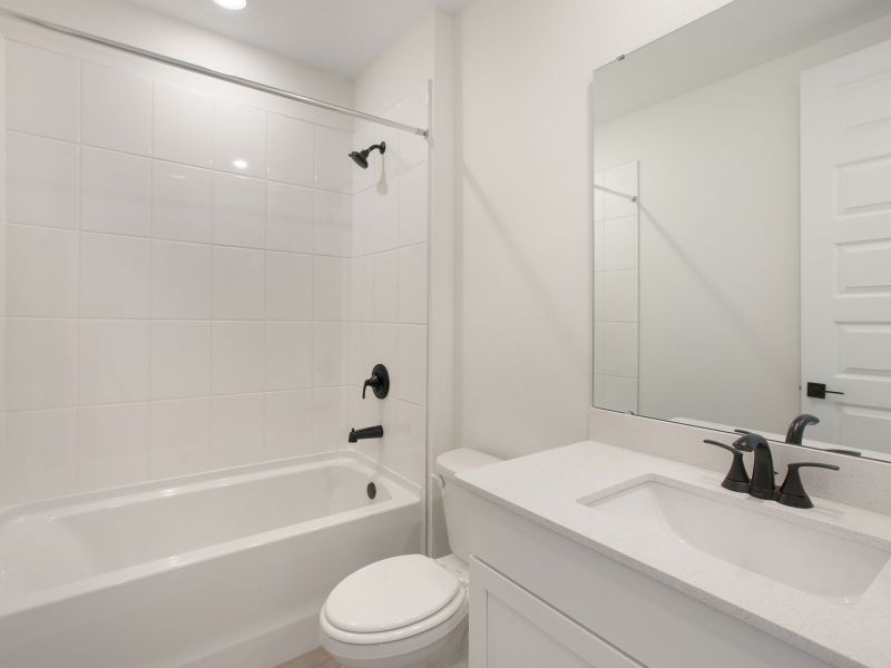 Furnished interior view inside a new home in Two Rivers - Signature Series, Zephyrhills (Image 4).