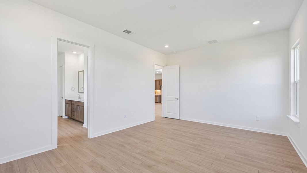 Spacious, unfurnished interior of a new home in The Enclave at Bar W Ranch, Leander (Image 25). Spacious, unfurnished interior of a new home in The Enclave at Bar W Ranch, Leander (Image 25).