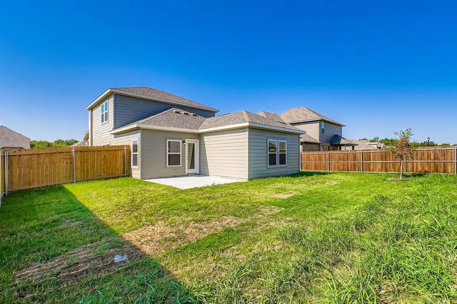 Exterior details and patio area of a home in MiraVerde, Crowley (Image 1). Exterior details and patio area of a home in MiraVerde, Crowley (Image 1).