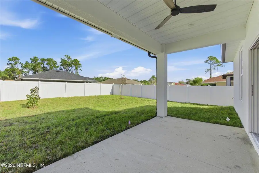 Exterior details and patio area of a home in , Palm Coast (Image 3). Exterior details and patio area of a home in , Palm Coast (Image 3).
