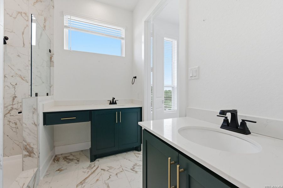 Furnished interior view inside a new home in Centero at Stone Oak, San Antonio (Image 9).
