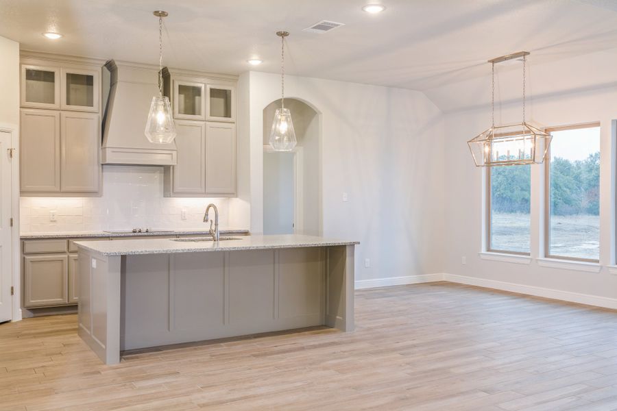 Representative furnished interior of a home built from the The Hudson by Doug Parr Custom Homes in Monarch Manor, Poolville (Image 5).