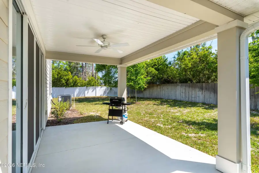 Exterior details and patio area of a home in Woodbridge, Fernandina Beach (Image 3).