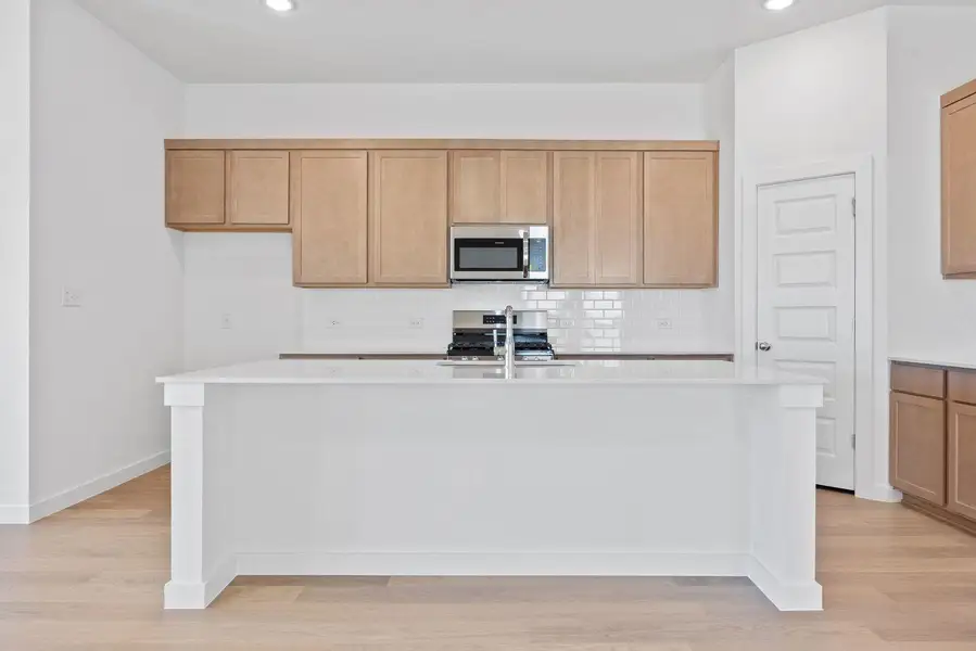 Furnished interior view inside a new home in Prairie Winds, Hutto (Image 4).