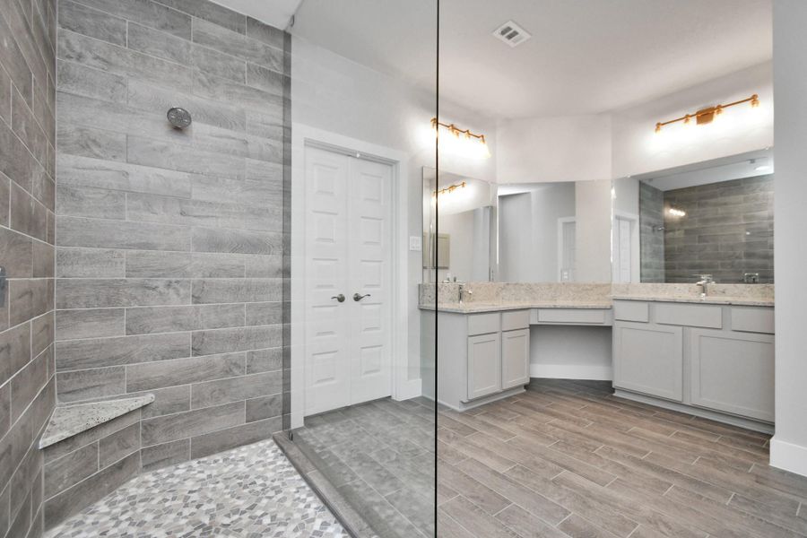 Another view of this spa-like re-treat. Sample photo of completed home with similar plan. As built color and selections will vary. Another view of this spa-like re-treat. Sample photo of completed home with similar plan. As built color and selections will vary.