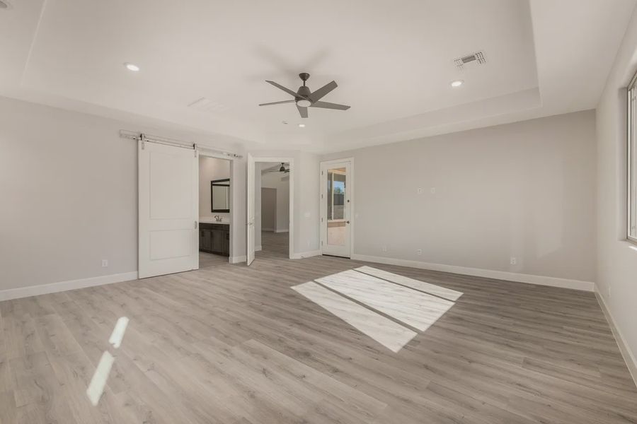 Spacious, unfurnished interior of a new home in Bellero Estates, Queen Creek (Image 27). Spacious, unfurnished interior of a new home in Bellero Estates, Queen Creek (Image 27).