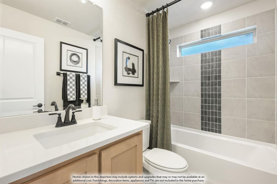 Bathroom with single vanity, white countertop, tub-shower combo with tile surround and curtain, and small window.