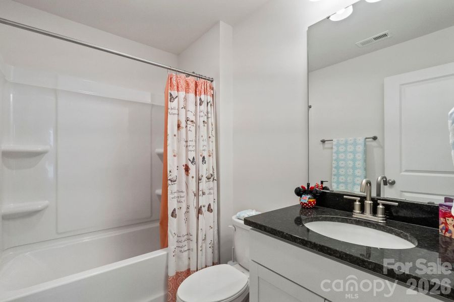 Furnished interior view inside a new home in Sylvan Creek, Denver (Image 16).