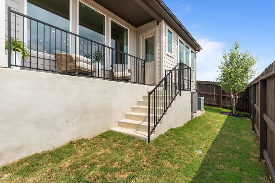 Exterior details and patio area of a home in Santa Rita Ranch, Liberty Hill (Image 28).