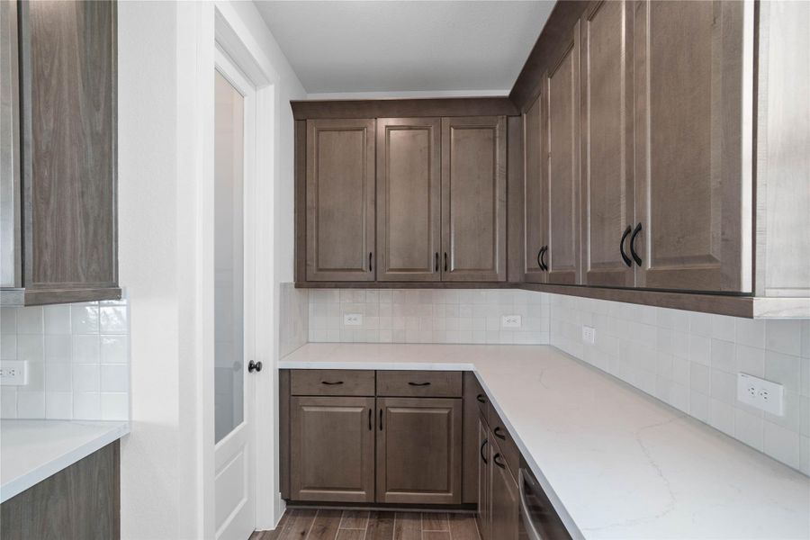 Furnished interior view inside a new home in ARTAVIA, Conroe (Image 15).