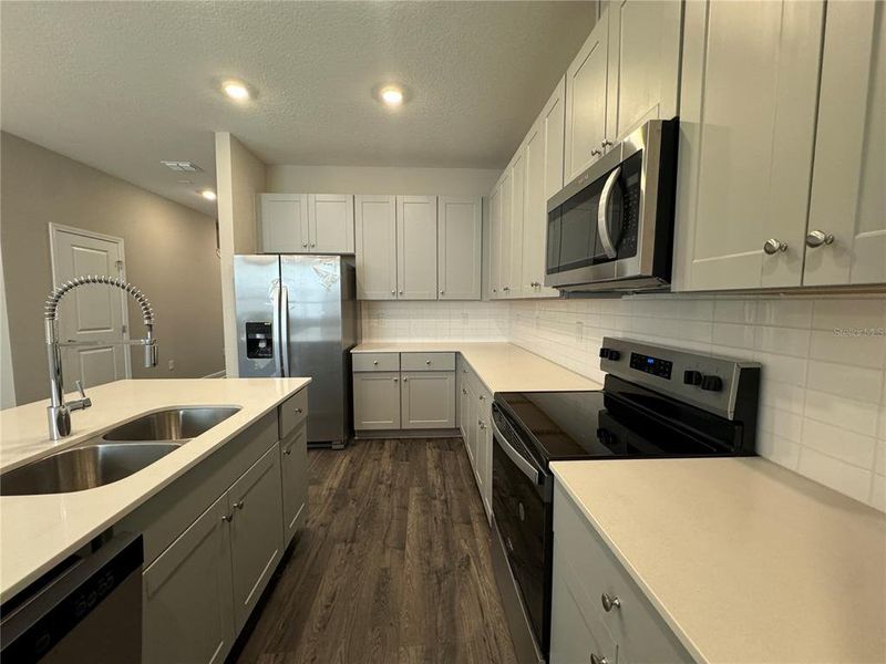 Furnished interior view inside a new home in , Winter Garden (Image 7).