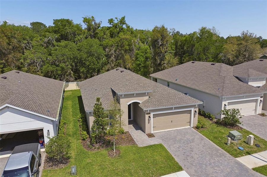 Front exterior of a new home in Cascades at Southern Hills, Brooksville, FL, highlighting curb appeal (Image 26).