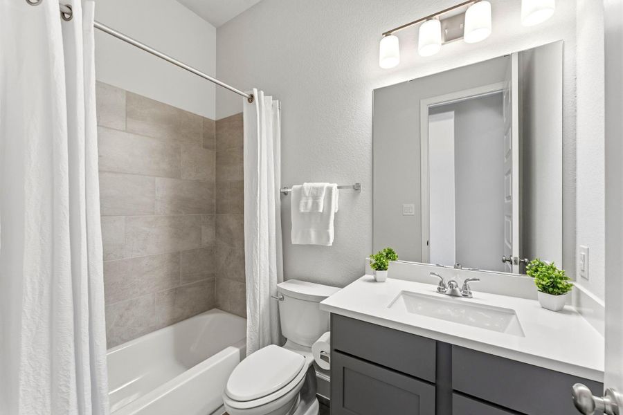 Secondary Bathroom Conveniently Located between Secondary Bedrooms Secondary Bathroom Conveniently Located between Secondary Bedrooms