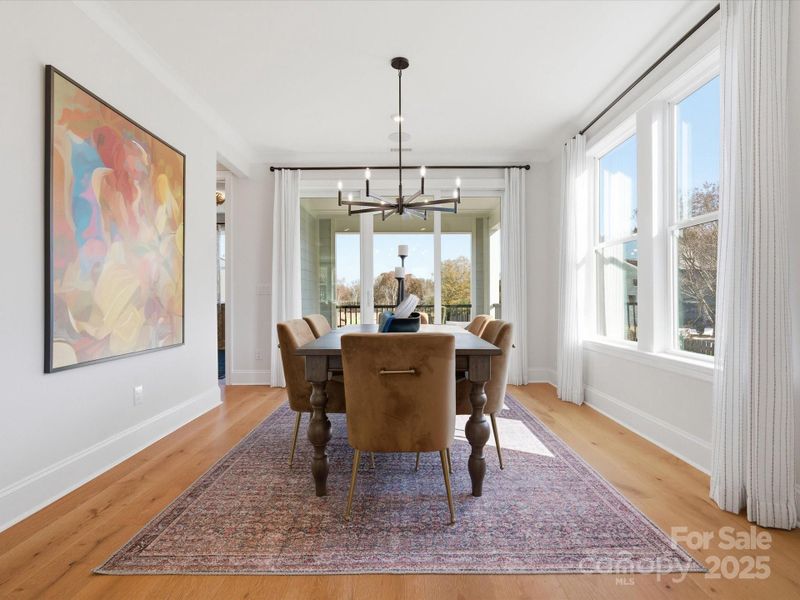 Large Sliding Glass Doors Lead to Outdoor Living. *Model Photos | Actual Finishes, Structural Selections, and Orientation May Vary. Large Sliding Glass Doors Lead to Outdoor Living. *Model Photos | Actual Finishes, Structural Selections, and Orientation May Vary.