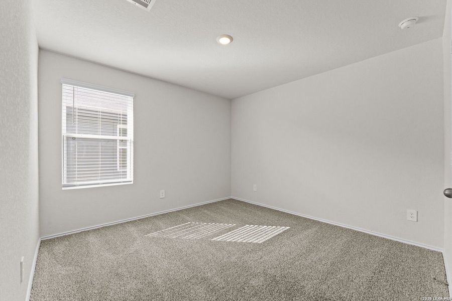 Spacious, unfurnished interior of a new home in Navarro Fields, Seguin (Image 24).