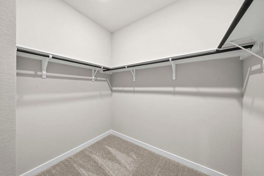 Walk-in closet in Primary Bedroom