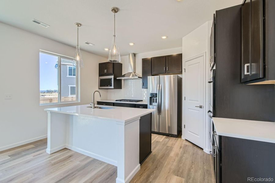 Furnished interior view inside a new home in Wolf Creek Run, Strasburg (Image 10).