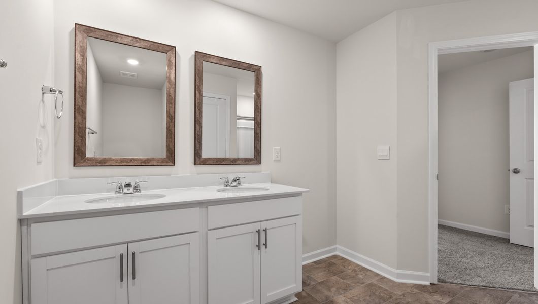 Furnished interior view inside a new home in Tanglewood Townes, Greenville (Image 10).