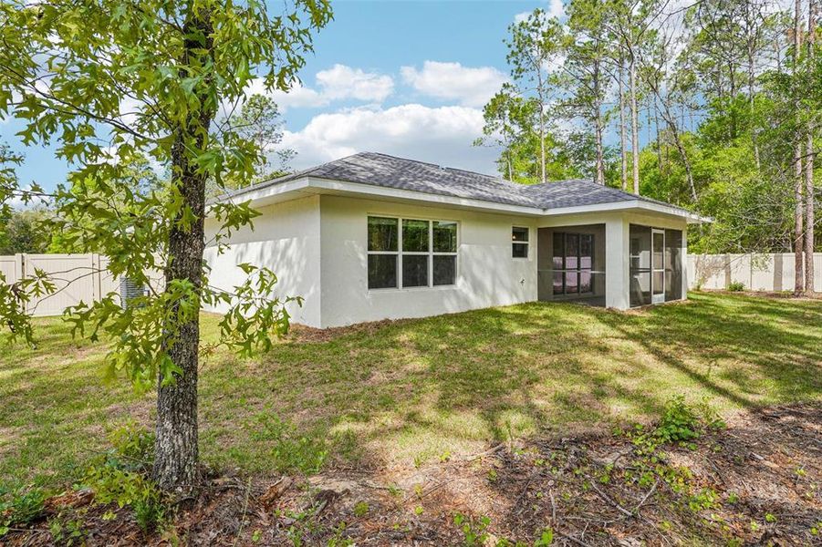Exterior details and patio area of a home in , Citrus Springs (Image 32).
