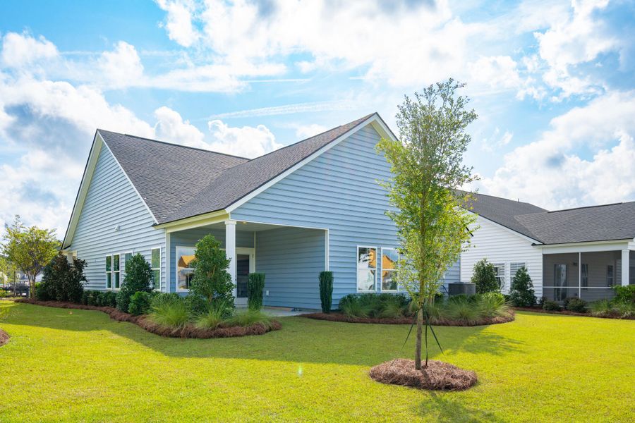 Front exterior of a new home in Sweetgrass at Summers Corner: Carolina Collection, Summerville, SC, highlighting curb appeal (Image 2). Front exterior of a new home in Sweetgrass at Summers Corner: Carolina Collection, Summerville, SC, highlighting curb appeal (Image 2).
