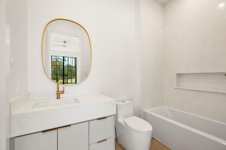 View of secondary bedroom bath. View of secondary bedroom bath.