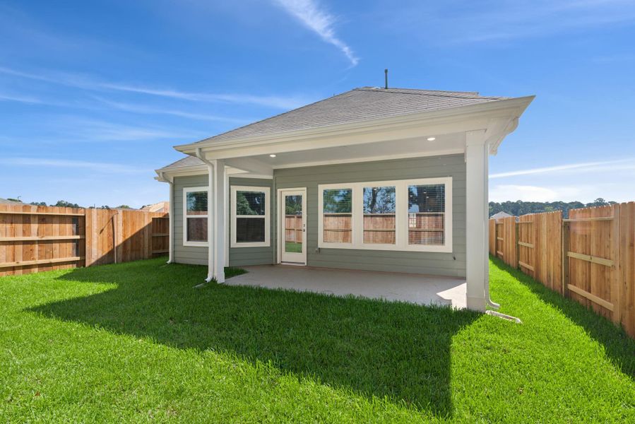 Front exterior of a new home in Lone Star Landing, Montgomery, TX, highlighting curb appeal (Image 14). Front exterior of a new home in Lone Star Landing, Montgomery, TX, highlighting curb appeal (Image 14).