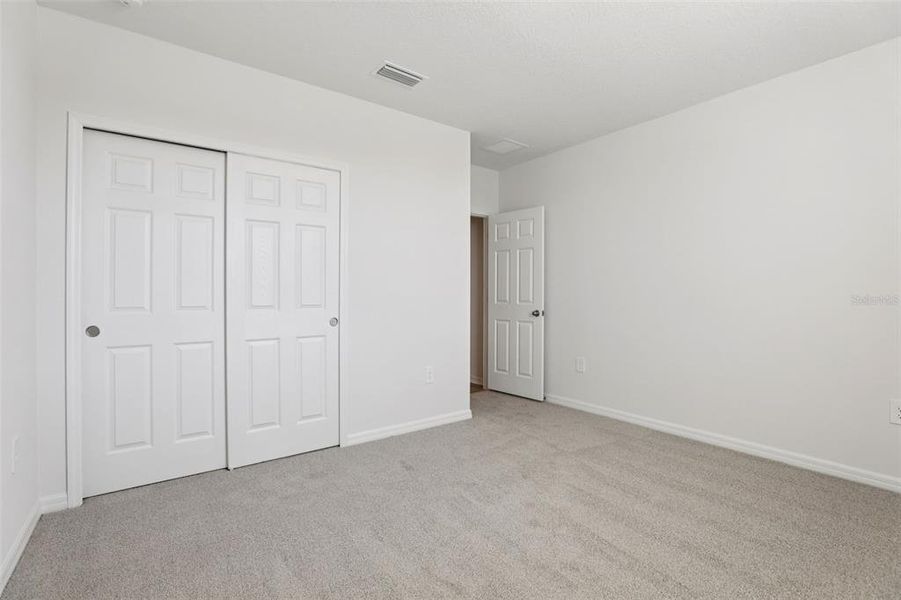 Spacious, unfurnished interior of a new home in Bradbury Creek - Signature Series, Haines City (Image 31).